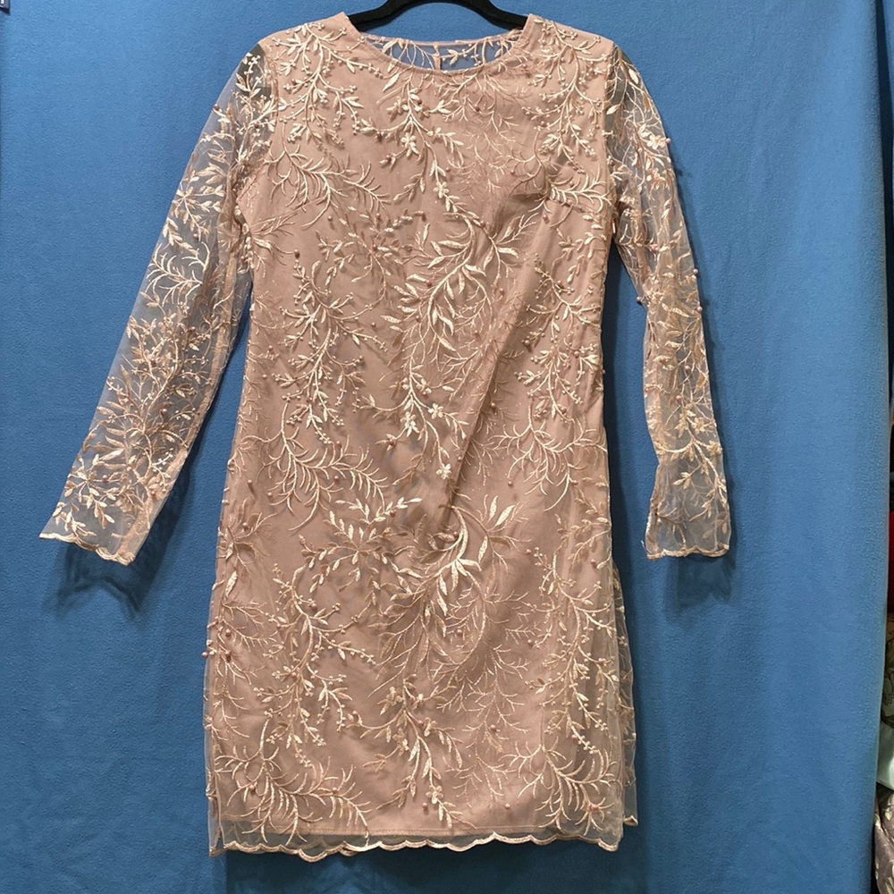 New cocktail see through sleeves and a back dress with side zipper size M
